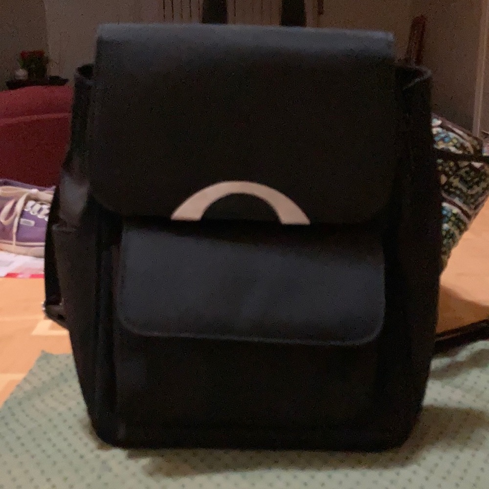 Great Mini Black Bagpack in excellent condition